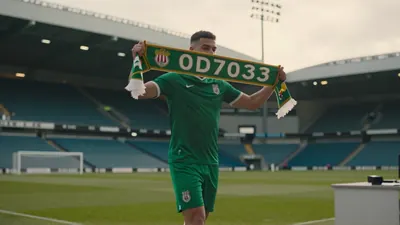 Forest Green boost their back line with 18-year-old Sydney Agina on loan from Stoke, signing a two-year extension as the...